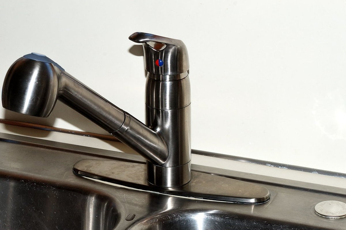 Vaughan Plumbing technician completing a plumbing repair