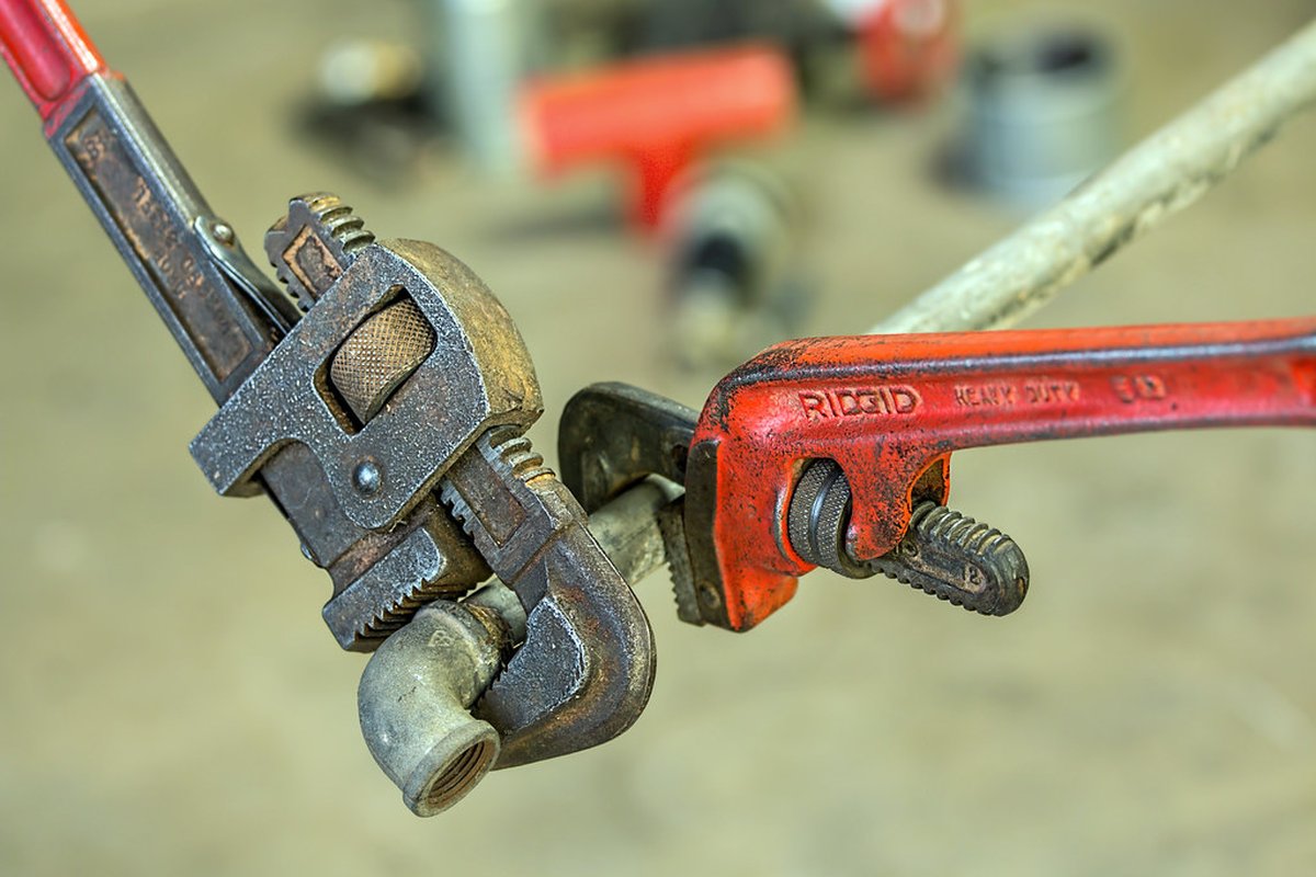 Pipe wrenches ready for a plumbing repair call